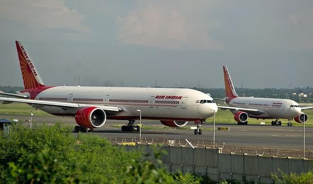 Air India planes prepare for take-off at the Indira Gandhi International Airport in New Delhi. (MANAN VATSYAYANA/AFP/GettyImages)